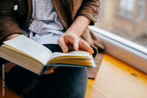 Young man reading a book