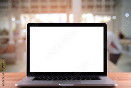  laptop with black screen on modern wooden desk