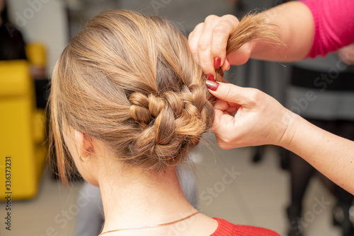 weave braid girl in a hair salon