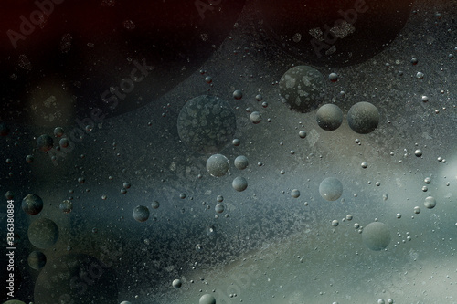 Abstrakcyjne wzory, koła przypominające planety w kosmosie - olejofotografia