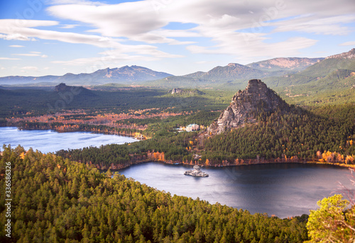 Majestic nature of Kazakhstan concept: epic view of Burabay lake with Okzhetpes and Zhumbaktas rocks at sunset in autumn season