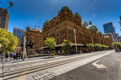 Sydney, Australia - 10th February 2020: A german photographer visiting the city center, taking pictures of the Queen Victoria Building as life went back after the bush fires in New South Wales.