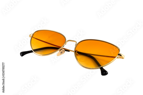 Orange cat eye sunglasses with gold wrap around frames for women isolated on white background, folded side view