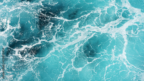 Abstraction of sea foam in the ocean. Dark water, storm waves
