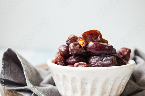 Date fruites, dates or sweet Iranian hurma. Natural organic dieting dessert food. Vegan meal.