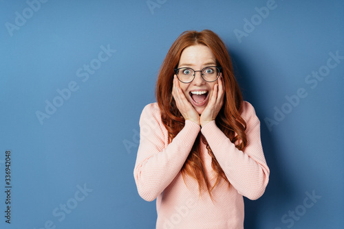 Young woman reacting an amazement