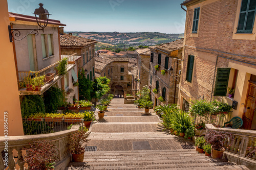 The Polenta Well steps of Corinaldo, Le Marche, Italy overlooking the beautiful Italian countryside on a warm Summer morning