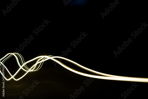Abstract glowing light trails