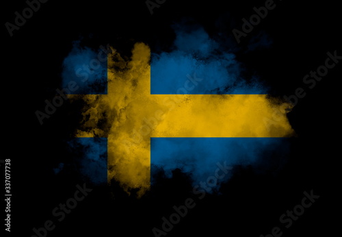 Sweden flag performed from color smoke on the black background. Abstract symbol.