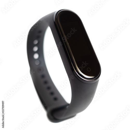 Smart activity fitness tracker isolated on white background. Sport bracelet band. Black fitness watch.