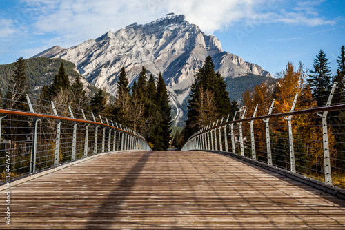 footbridge leading to mount cascade, banff national park, alberta, canada
