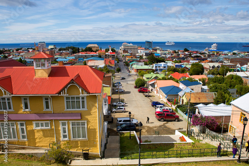 Punta Arenas, Chile, Cityscape. Views of Gorod Serna point. You can see the hotel building. There is a cruise ship on the reid in the Strait of Magellan.