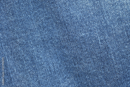 Abstract fabric texture of blue jeans or denim background.