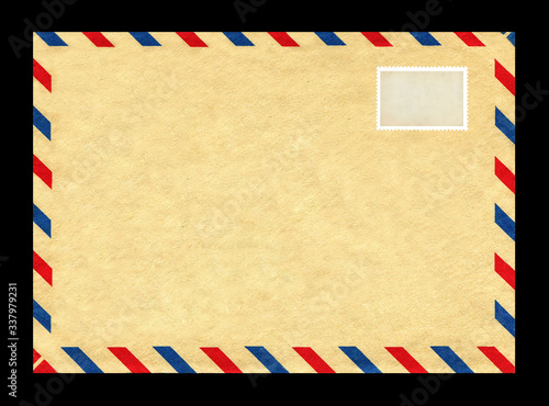 Vintage postage envelope on a black background, message, air mail