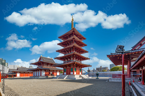 Shitennoji is one of the oldest Buddhist temple in Osaka, The five story pagoda and blue sky background at Shitennoji Temple, The oldest ancient architecture temple in Osaka, Japan.