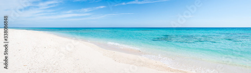 Beach panorama with turquoise water and white sand