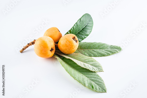 Fresh loquat fruit on white background