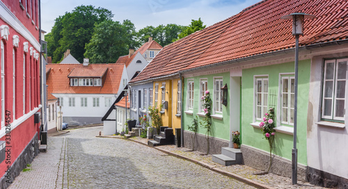 Panorama of a street with little colorful houses in Haderslev, Denmark