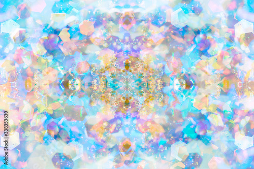 Mystical rainbow background, kaleidoscopic pattern with glitter and spots of light