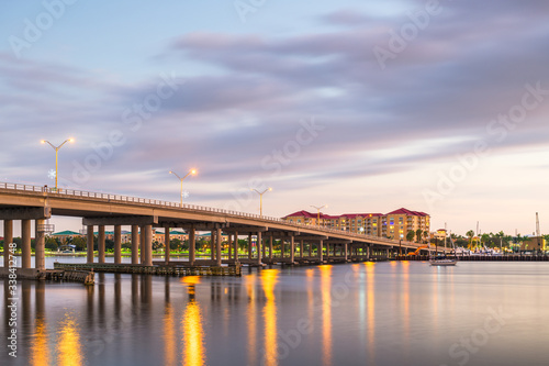 Bradenton, Florida, USA downtown on the Manatee River at dusk.