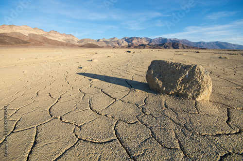Stone on cracked ground at Death Valley National Park