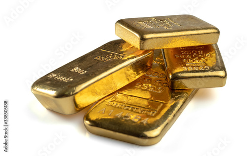 Several gold bars of different weight isolated on a white background.