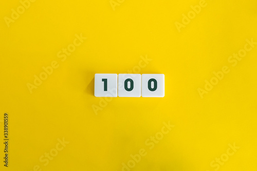 Number hundred (100) on block letters, on the yellow background. Minimal Aesthetics.