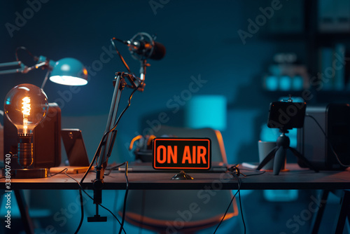 Live online radio studio with on air sign