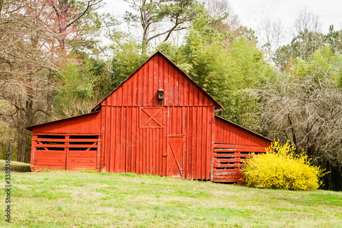 old red barn in the field