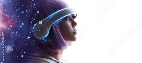 Beautiful woman with purple hair in futuristic costume over white background. Girl in glasses of virtual reality. Augmented reality, game, future technology, AI concept. VR. Blue, violet neon light. 