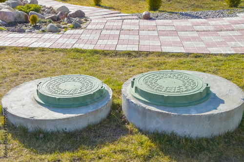 manhole sewer cleaning system on the ground on a Sunny spring day