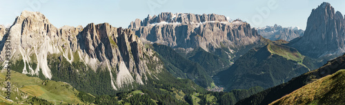Amazing panoramic view in the Dolomites mountains. Views from Seceda over the Odle rocks are spectacular. Beautiful aerial shot of the valley. Italian nature horizon landscape. Freedom concept.