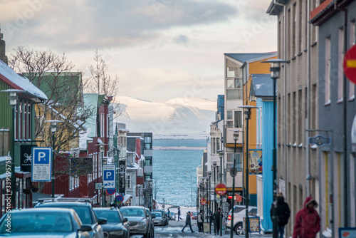 colorful street leading to water in reykjavik iceland