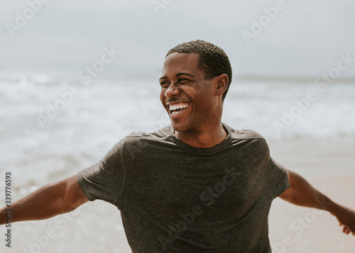 Playful man on the beach