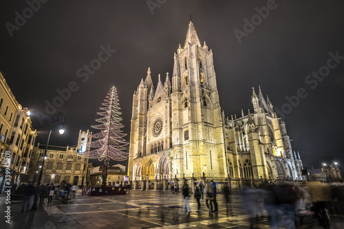 Leon Gothic cathedral rainy night reflections in the water, christmas tree and lights, Castilla Leon Spain