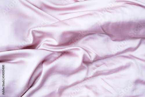 Pink silk duvet cover. Pink tencel background. Fabric tencel bedding.