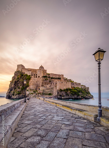 Naples, Italy 2017 dawn at Aragonese Castle Romantic medieval castle on a islet joined to Ischia by a stone bridge, plus tours & tunnel access. 