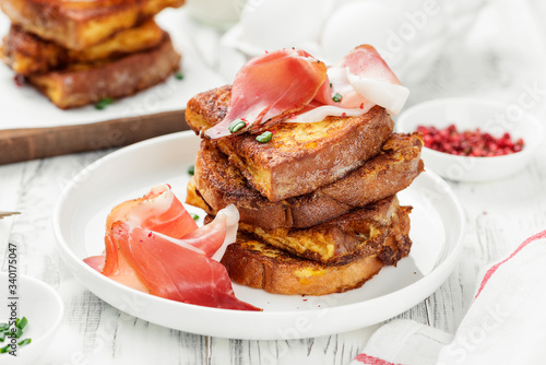 French toasts with italian prosciutto for delicious breakfast 