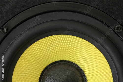 Yellow woofer, black audio enclosure