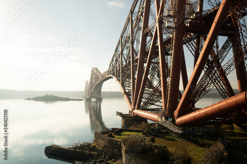 Unique Forth Bridge, a UNESCO World Heritage Site, carries the rail tracks from South to North Queensferry, Edinburgh. Scotland. 
