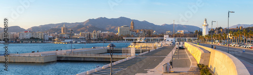 Breathtaking romantic summer panoramic view of port and harbor in soft evening sunlight. Costa del Sol. Malaga. Andalusia. Spain.