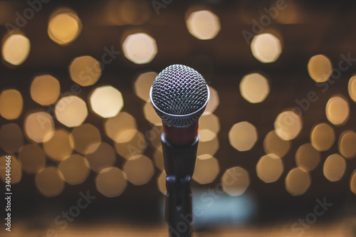 Microphone On The Theater Stage Before The Concert With Blurred Lights