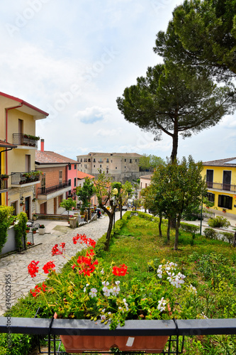 A narrow street between the old houses of Gesualdo, a village in the province of Avellino