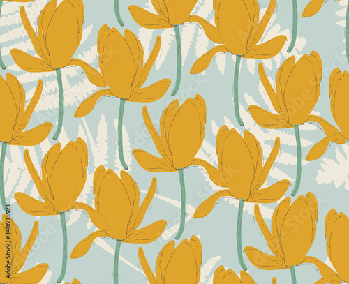 Vector blue seamless pattern background with magnolias. 