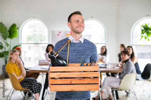 Happy businessman quitting his job 