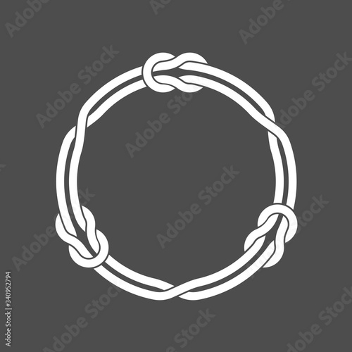 Circle frame with knots and three linked loop ropes. White on dark background round wires decoration.