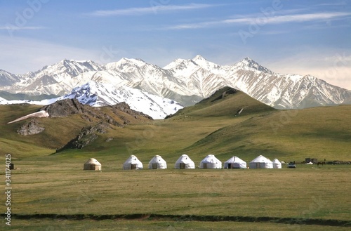 The ger camp in a large meadow at Song kul lake , Naryn of Kyrgyzstan