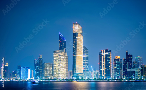 night view of Beautiful City of Abu Dhabi taken during blue hour view from marina backwater UAE 