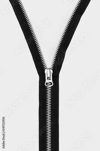 isolated black zipper with metal lock on white background