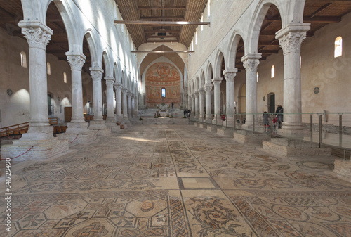 Interior of early christian basilica in Aquileia with famous mosaics, Friuli, Venezia Giulia, Italy